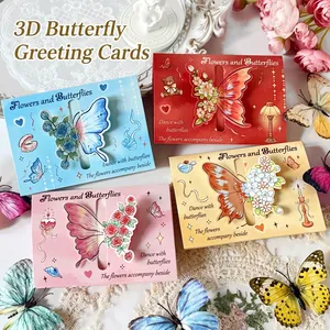 Detailed view of 3D butterfly greeting cards with floral motifs for festive gift giving