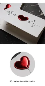 Close-up of 3D red metallic leather heart detail on elegant Valentine greeting card