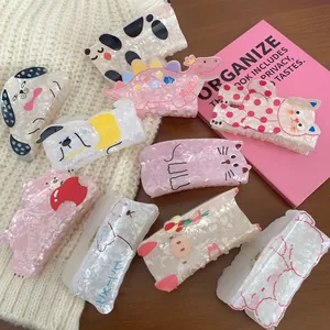 Cute acrylic animal-shaped hair clips in various pastel colors and cartoon designs