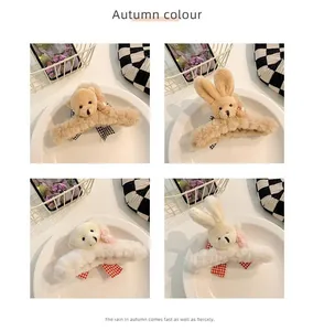 Selection of cute plush bear and rabbit hair claw clips in soft beige and cream colors