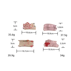 Product dimensions and weight details for acrylic cat and pig cartoon hair claw clips