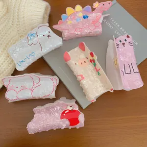 Variety of cute acrylic animal hair claw clips featuring cat dog pig and dinosaur designs