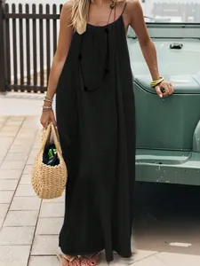 Elegantes schwarzes rückenfreies Maxikleid für Sommerurlaub und bequeme Loungewear.