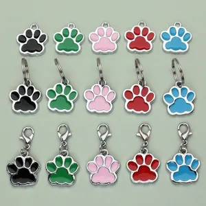 Multiple colorful alloy paw print pet ID tags with lobster clasps and split rings