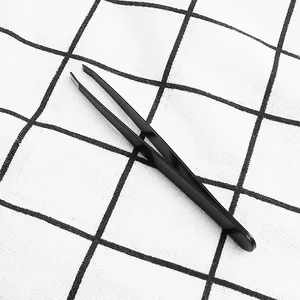 High-precision black slanted-tip eyebrow tweezers for professional facial hair grooming.