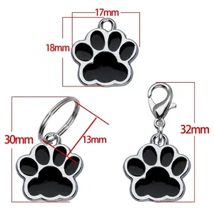 Detailed size guide for silver paw print alloy pet ID tags with black enamel finish