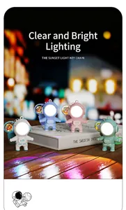 Detailed view of astronaut sunset light keychains in four colors with glowing visors