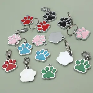 Customizable paw print alloy pet ID tags in various vibrant enamel colors.