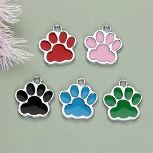 Detailed view of colorful alloy paw print charms for DIY pet tags and accessories