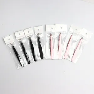 Professional stainless steel eyebrow tweezers set in black and pink for precision grooming