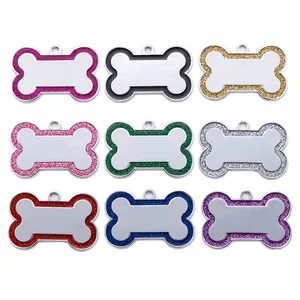 Set of nine bone-shaped pet ID tags with colorful glitter edges for dogs and cats