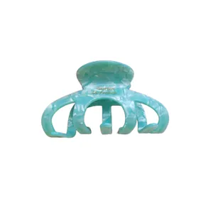 Elegant large light blue acetate pumpkin hair claw clip for thick hair with marbled pattern