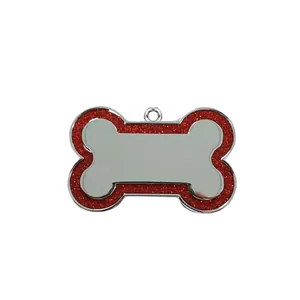 Detailed view of bone shaped pet ID tag with a red glitter border and mirror finish.