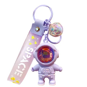 Cute purple astronaut keychain with sunset light effect and SPACE strap accessory