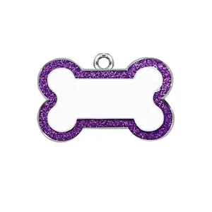 Detailed macro view of a bone-shaped pet ID tag with purple glitter border and white center