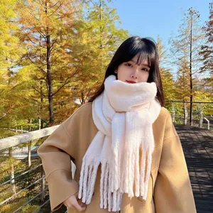 Stylish thick warm off-white plush scarf with long tassels for autumn winter outfits