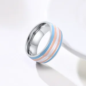 Close-up of 8mm stainless steel ring with blue, pink and white stripes