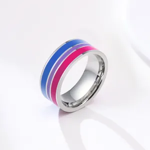 Close-up of 8mm stainless steel ring with blue, purple, and pink pride stripes.