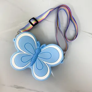 Adorable children's butterfly-shaped silicone crossbody bag with a colorful rainbow strap