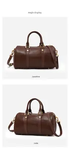 Detailed front and side views of this retro brown Boston handbag with gold hardware