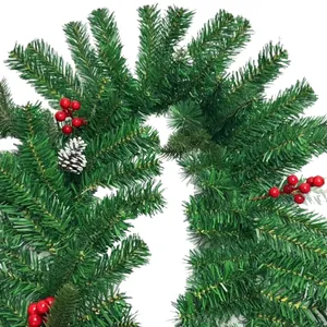 Lush artificial Christmas garland with red berries and pine cones on white background