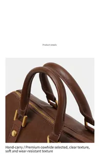 Close-up of premium cowhide leather handle on a brown vintage Boston bag