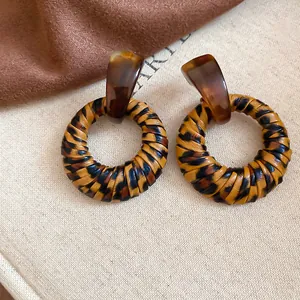Vintage leopard print leather wrapped geometric hoop earrings with resin stud top
