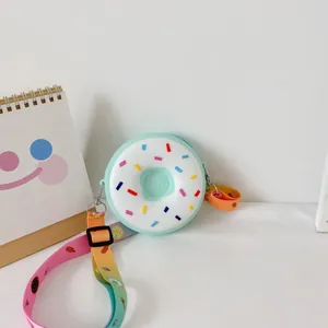 Cute donut-shaped silicone mini crossbody bag with rainbow strap for toddlers and girls