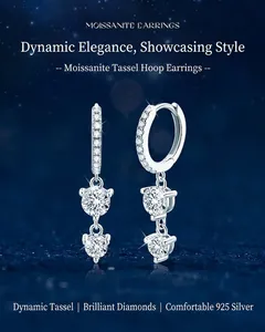 Exquisite detail of 925 sterling silver hoop earrings featuring sparkling moissanite drops