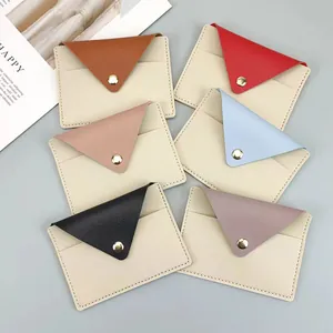 Minimalist slim envelope card holders in six vibrant colors with gold snap buttons