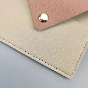 Macro detail showing high-quality leather texture and stitching on a slim card holder