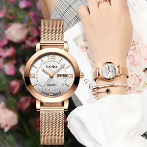Elegant rose gold quartz watch for women featuring mesh strap and day-date display