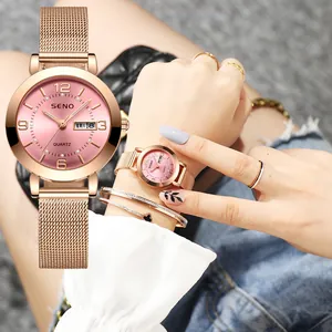 Elegant rose gold women's quartz watch with pink dial and dual date display mesh strap