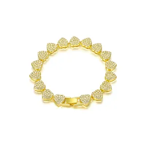 Detailed view of heart-shaped bracelet links fully encrusted with clear sparkling rhinestones