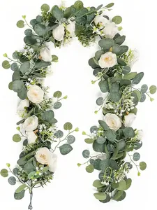 High-quality detailed view of eucalyptus garland with white roses and baby's breath accents