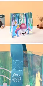 Close-up of the durable blue nylon strap and laser PVC material of the cartoon tote bag