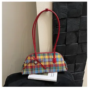 Retro multi-colored plaid underarm baguette bag with bright red long shoulder straps