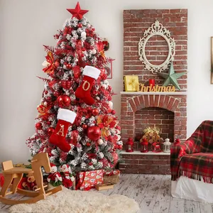 Large red velvet Christmas stockings with embroidered gold letter A and Q on tree