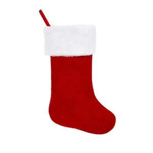 Classic red and white plush Christmas stocking for holiday decoration and gifts