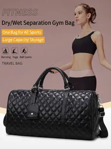 Black quilted leather travel gym bag for fitness and yoga activities