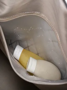 Detail of travel bag interior with waterproof dry-wet separation pocket and zipper