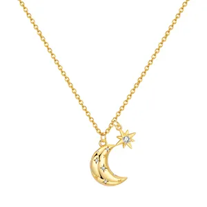 Detailed view of the gold-plated crescent moon and sparkling star pendant necklace.