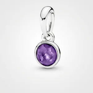 Detailed view of a purple birthstone charm pendant with silver-plated finish for DIY jewelry.