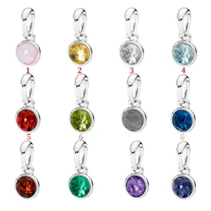 Set of 12 silver-plated birthstone charm pendants featuring colorful round gemstones
