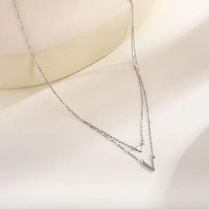 Elegant S925 sterling silver double-layer necklace with V-pendant and geometric triangle