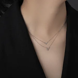 Elegant S925 sterling silver double-layer necklace with V and triangle pendants