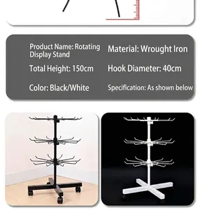 Mobile rotating metal display rack for accessories and socks, 150cm tall with wheels.