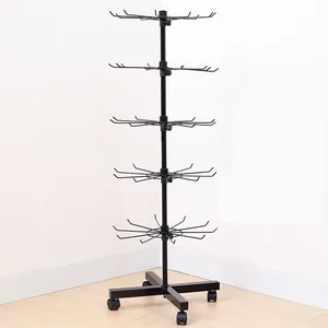 5-tier rotating black metal floor display rack with wheels for retail storage.