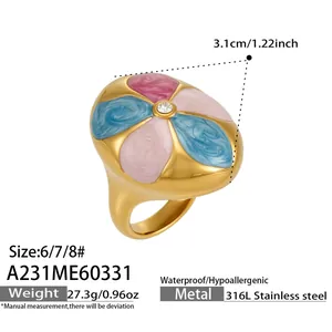 Macro view of detailed stainless steel enamel flower ring featuring inlaid zircon center