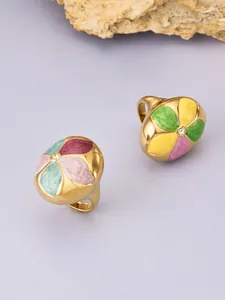 Detailed macro view of colorful enamel flower petal ring with zircon in gold-plated steel